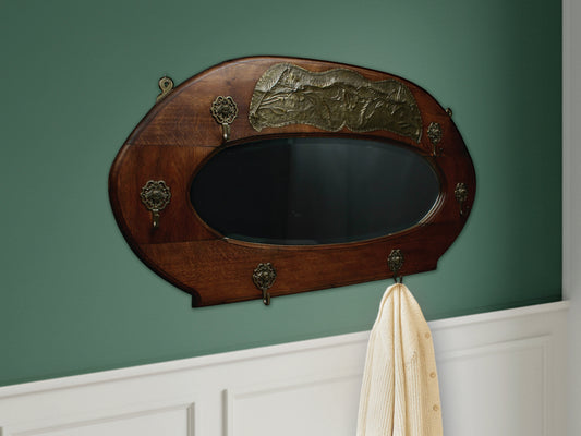 This vintage mirror wall coat rack is a stunning, unique mirror coat rack that's perfect for your modern or vintage home decor. Featuring a large beveled antique mirror set into a solid wood frame, it serves as a functional wall mount coat rack. Curated in Belgium, this piece is an ideal entryway coat rack / entryway mirror, bringing a functional and luxurious touch to any space.