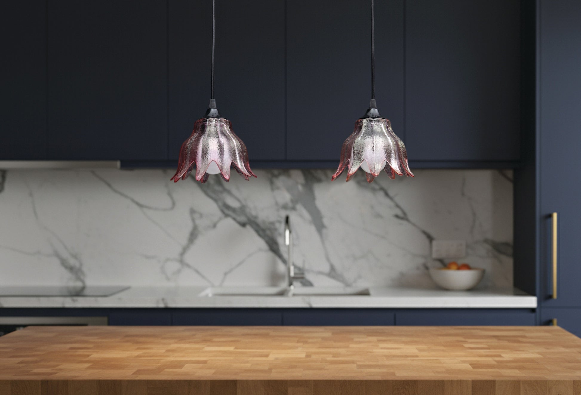 Transforming antique lighting glass shades into modern pendant lights! These stunning pink shades are 2 of 7 we salvaged from a beautiful but worn-out antique chandelier. Capture the essence of vintage charm while adding a touch of contemporary elegance to your space with these gorgeous hanging lights.