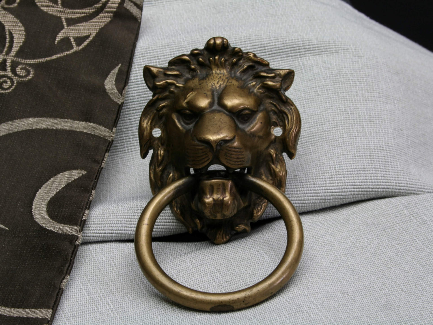 Dress up your front door hardware with a vintage brass door knocker or antique door pull. Find antique and vintage hardware like antique drawer pulls, brass knobs, or French antique brass handles.