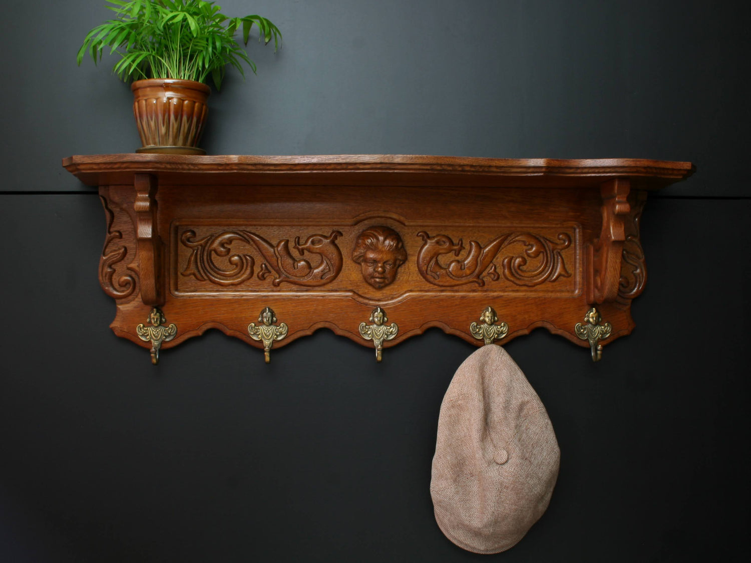 Antique coat racks ranging from 19th Century to 20th Century vintage coat racks. Designs vary from a wall mount coat racks, standing coat racks to coat racks with shelves, and more unique finds.
