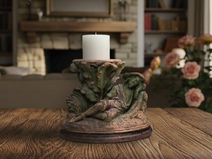  J. Uffrecht antique terracotta sculpture, U&C 620 mark, used as a weathered green candle or plant holder.
