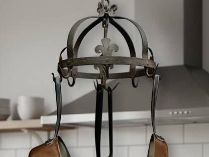 Gorgeous French antique wrought iron hanging rack from the late 1800s Originally a sausage dryer, this versatile hanging pot rack features eight large wrought iron hooks and three smaller ones. If you're looking for that one of a kind ceiling pot rack for your modern or vintage home decor, this is it.