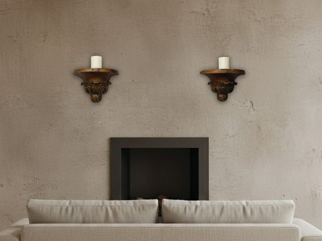 Antique Wood Corbels styled as wall display shelves above a fireplace, representing the unique vintage home decor collection.