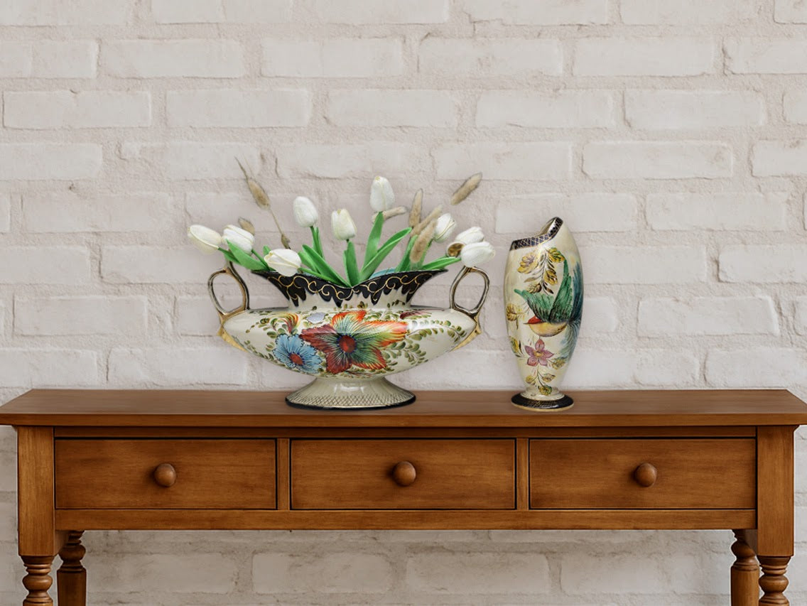 Elegant hand-painted jardiniere and porcelain vase by H. Bequet, with floral details and gold accent makes an ideal centerpiece vase for modern or vintage home decor. The decorative vase features raised relief outlining the flowers, leaves, and bird. 