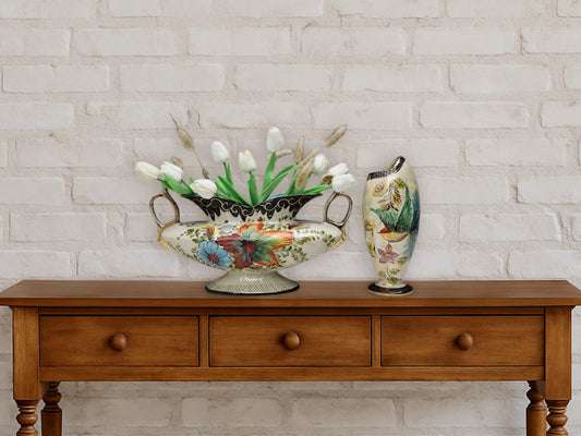 Elegant hand-painted jardiniere and porcelain vase by H. Bequet, with floral details and gold accent makes an ideal centerpiece vase for modern or vintage home decor. The decorative vase features raised relief outlining the flowers, leaves, and bird. 
