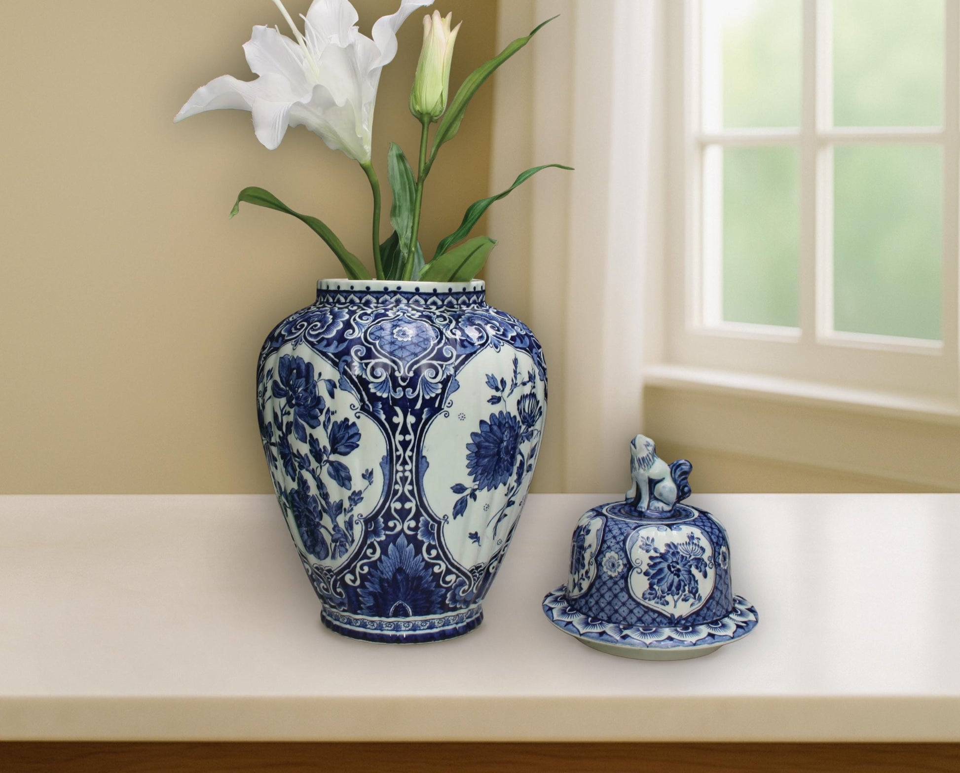 1950s vintage Delft Blue and white vase with floral motifs and Foo Dog lid. Large ceramic ginger jar marked Royal Sphinx Maastricht. Authentic Delft pottery decorative vase or unique urn for modern and vintage home decor.