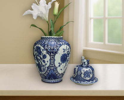 1950s vintage Delft Blue and white vase with floral motifs and Foo Dog lid. Large ceramic ginger jar marked Royal Sphinx Maastricht. Authentic Delft pottery decorative vase or unique urn for modern and vintage home decor.