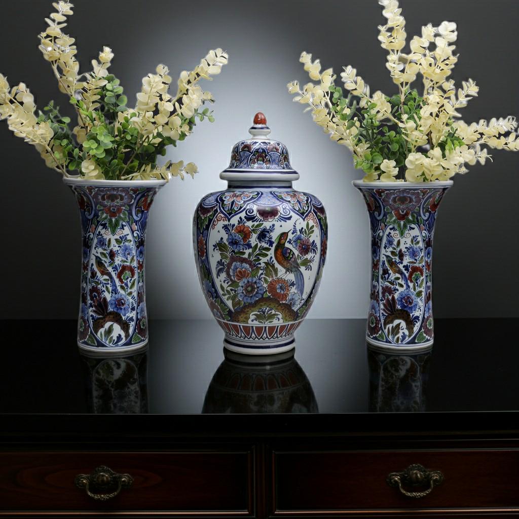 Vintage multicolored Delft 3-piece ginger jar and decorative vase set.
