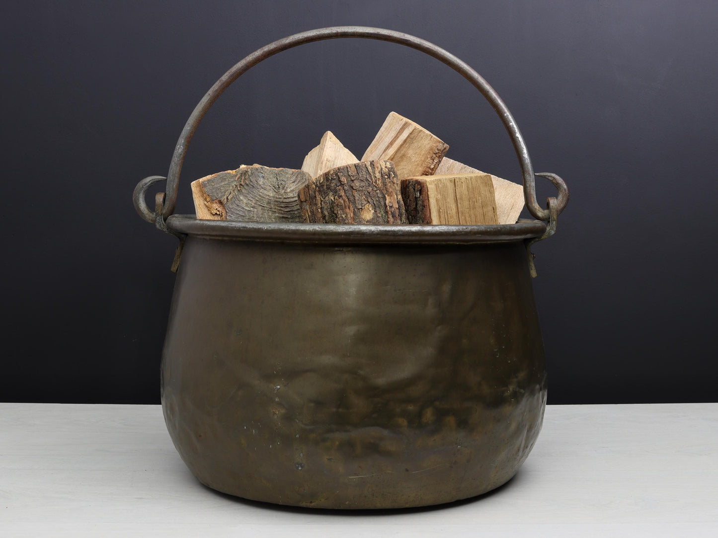 Antique Kettle and Fireplace Log Holder for Rustic Home Decor