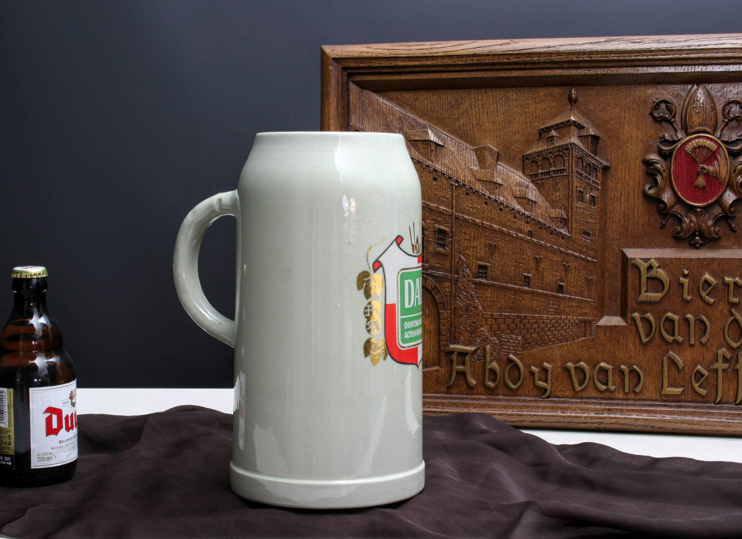 German beer stein with DAB logo on one side and on the bottom is the mark from Marzi and Remy  